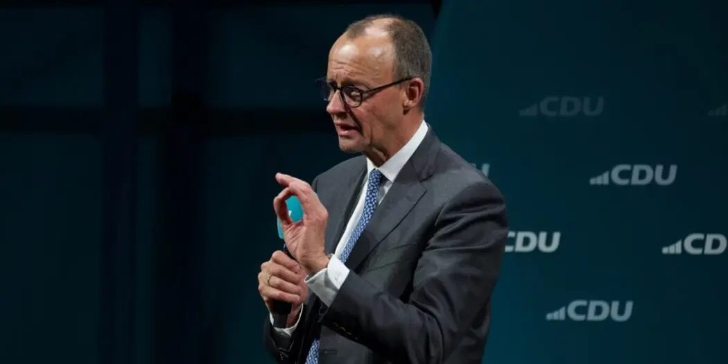 Photo von Friedrich Merz, diskutierend