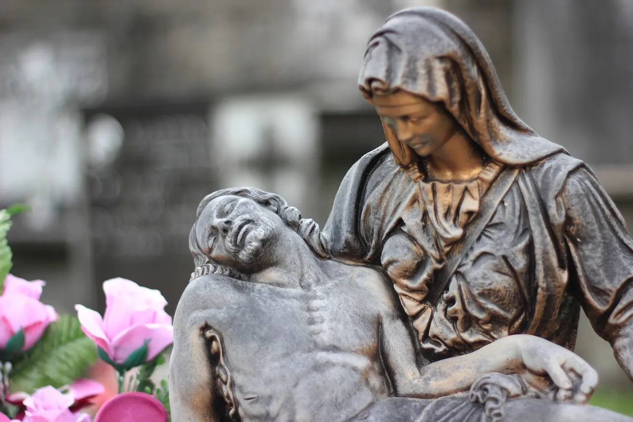 Image of a mother holding her dead son