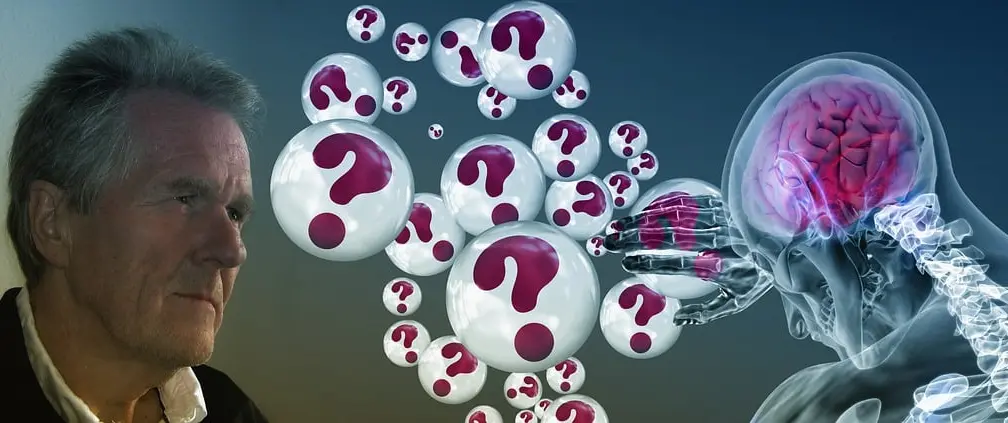 Image of a man, some bubbles with question marks in them and a figure that looks like an android, its hand raised in direction of the bubbles, its back to the viewer, the man looking rather strictly at the figure.