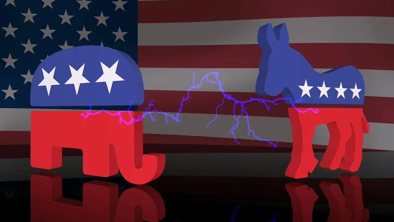 Image of the icons for the Democrat's and Republican's respectively, the donkey and the elephant. With a star more painted on the Democrat's lucky charm.